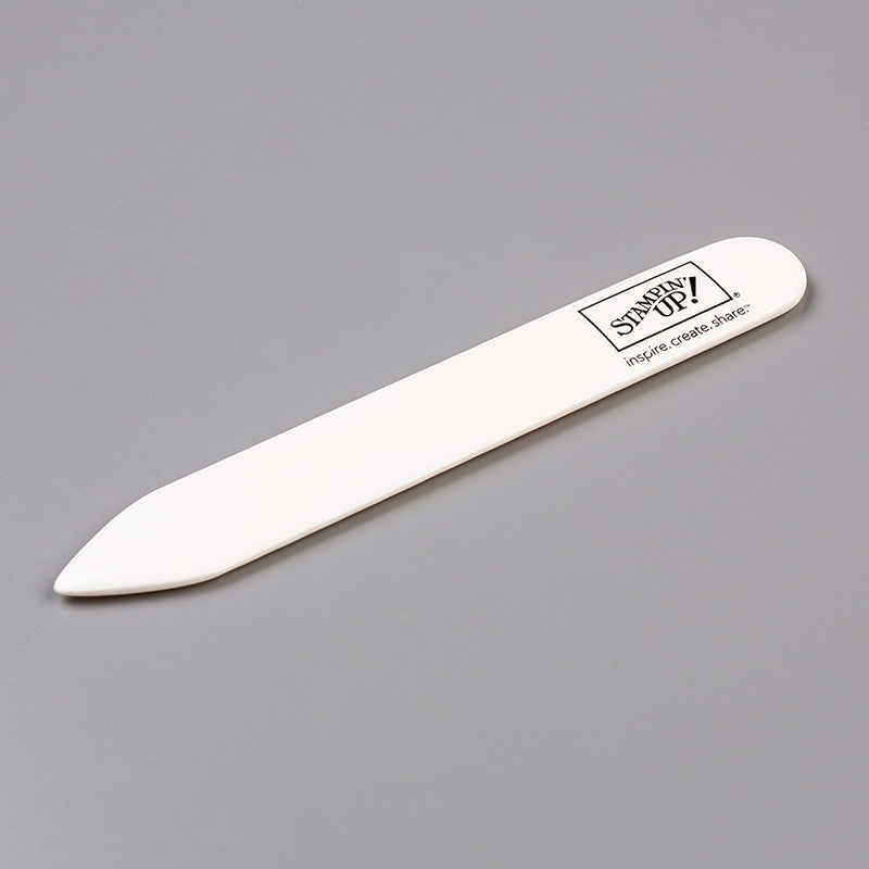 beige bone folder tool